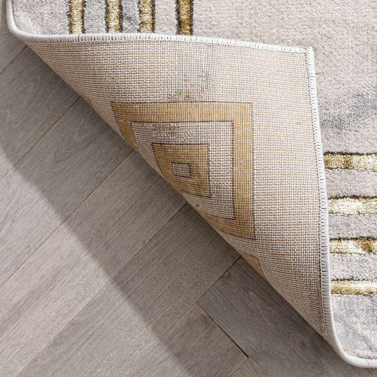 Ivory Abstract Easy-Care Stain-Resistant Synthetic Area Rug 5' x 7'