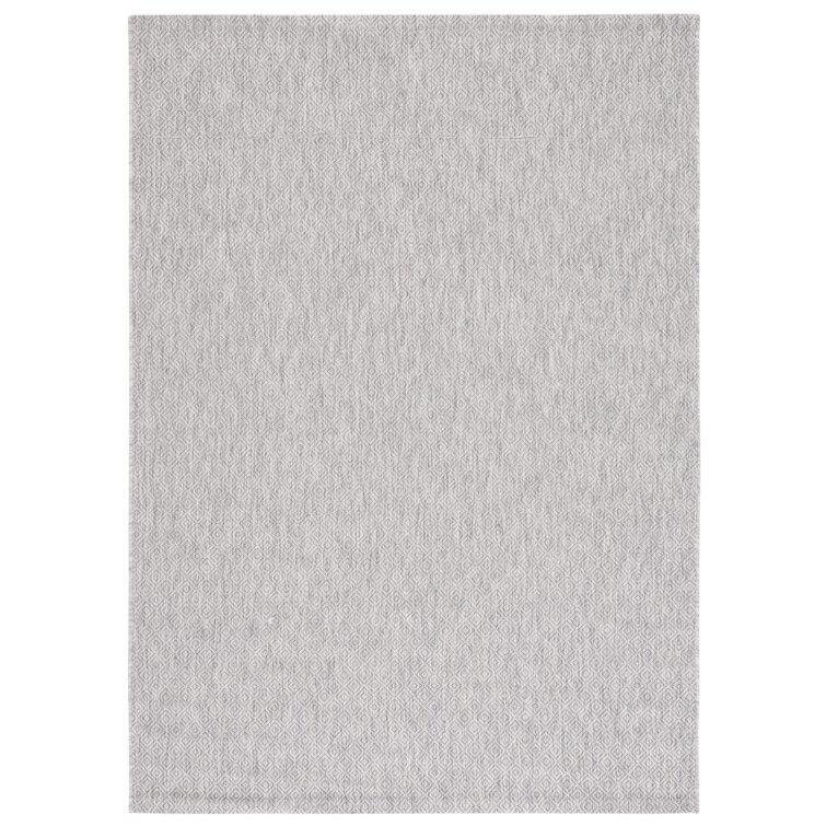 Delano Monochrome Gray Synthetic 6'7" x 9'6" Indoor/Outdoor Rug