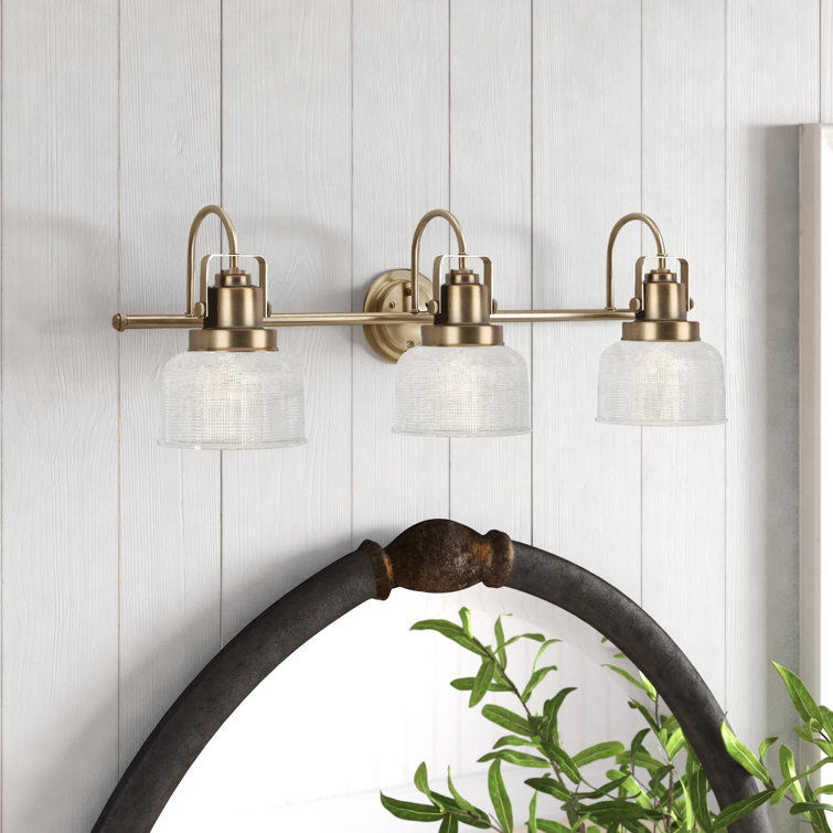 Archie Vintage Brass 3-Light Bathroom Vanity with Prismatic Glass Shades