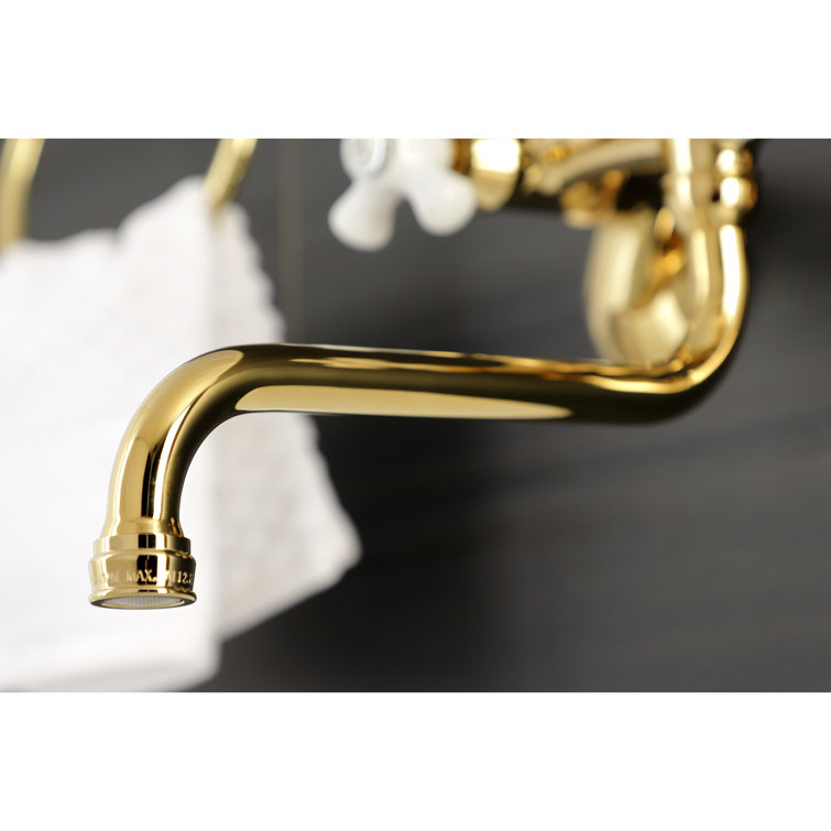 Elegant Kingston 5.44" Brass Wall Mount Bathroom Faucet in Polished Brass