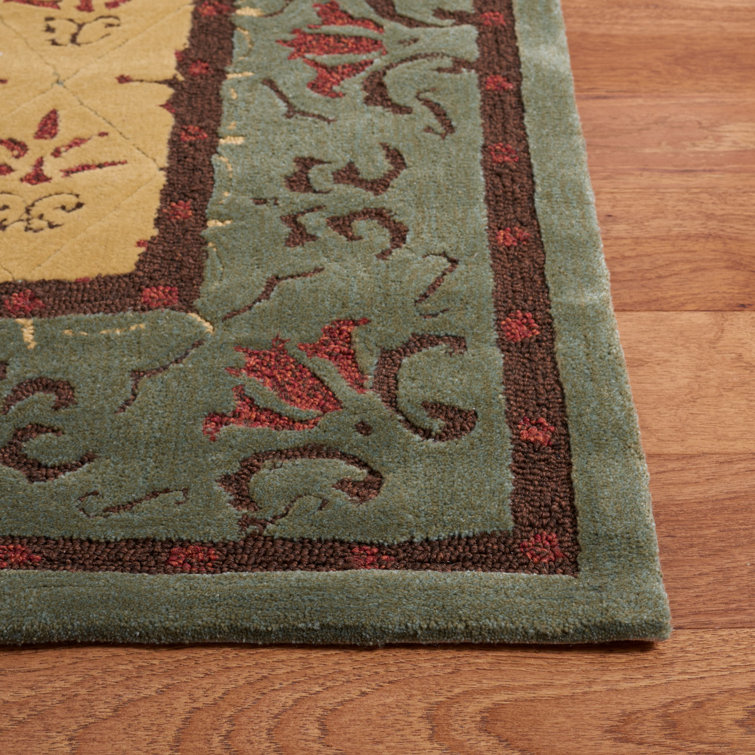 Handmade Red and Beige Floral Wool Accent Rug 2' x 3'