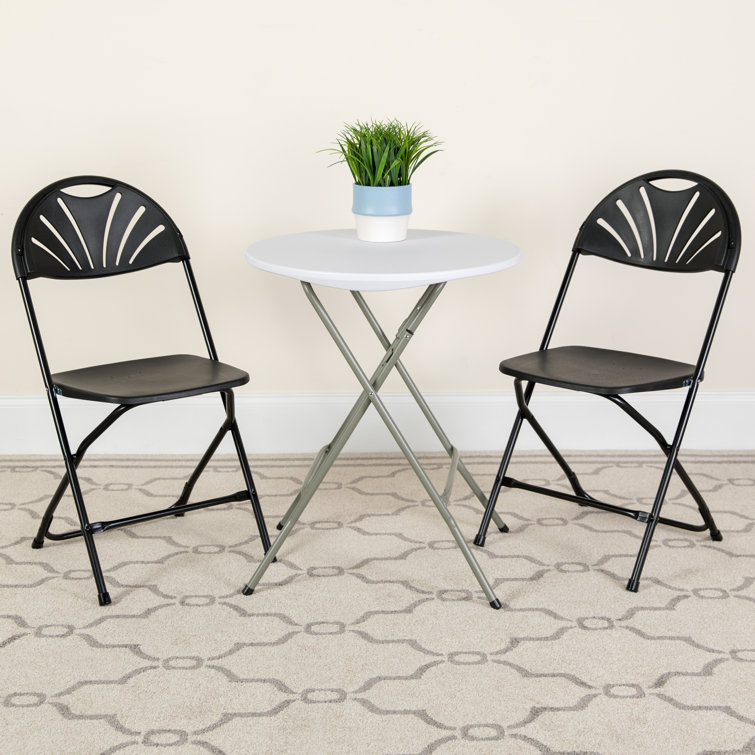 Hercules Series 650 lb Capacity Black Plastic Fan Back Folding Chair