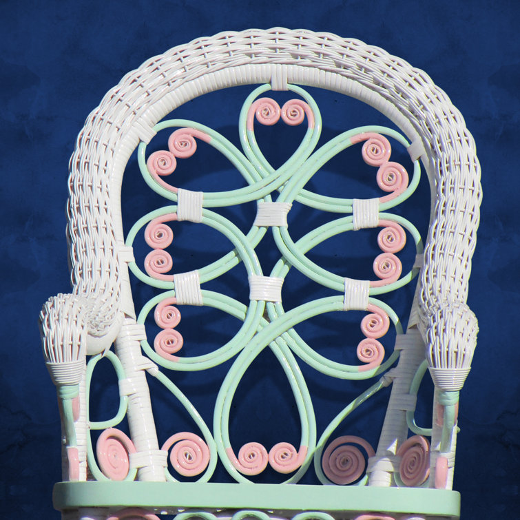 Victorian White Wicker Rocking Chair with Pink and Green Accents