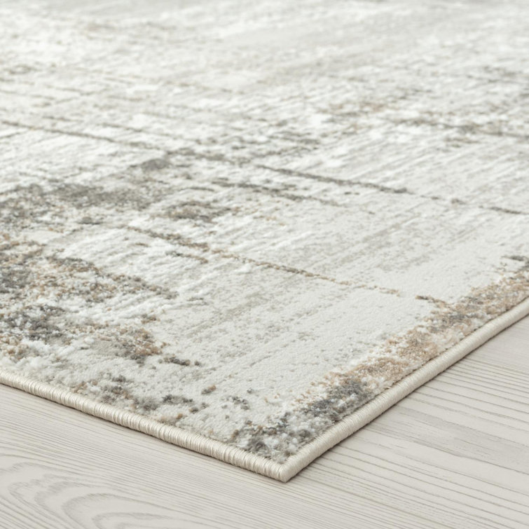 Beige Abstract 6' x 9' Synthetic Area Rug