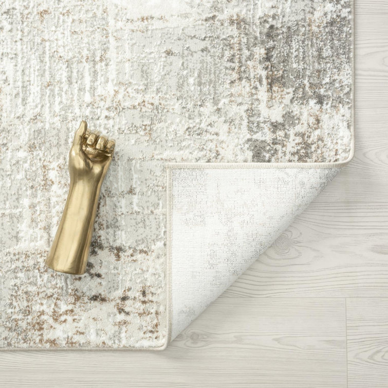 Beige Abstract 6' x 9' Synthetic Area Rug