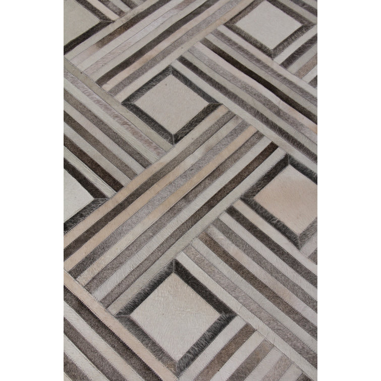 Handmade Ivory Geometric Cowhide Area Rug, 5' x 8'