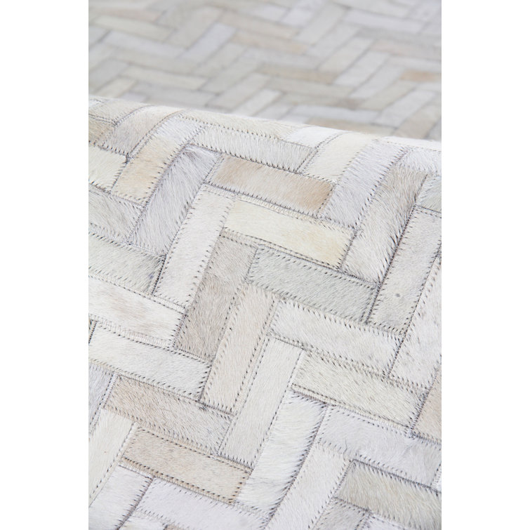 Handmade Ivory Geometric Cowhide 8' x 11' Area Rug