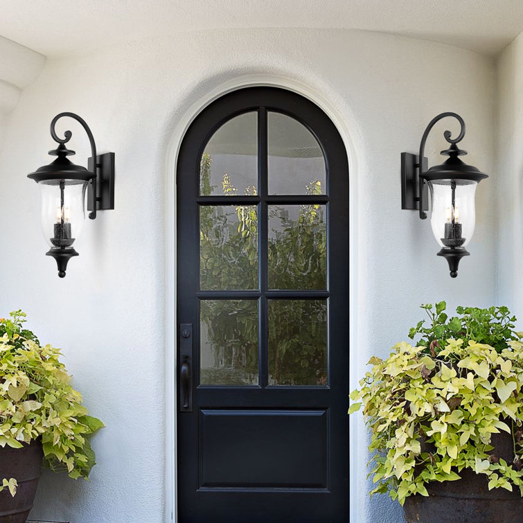 Dowell Black Metal 2-Light Outdoor Wall Sconce with Clear Shade, Set of 2