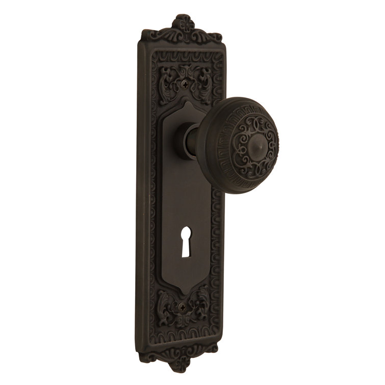 Unlacquered Brass Egg & Dart Plate with Decorative Keyhole and Door Knob
