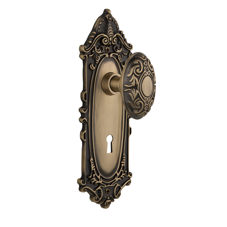 Antique Brass Victorian Plate with Ornate Door Knob
