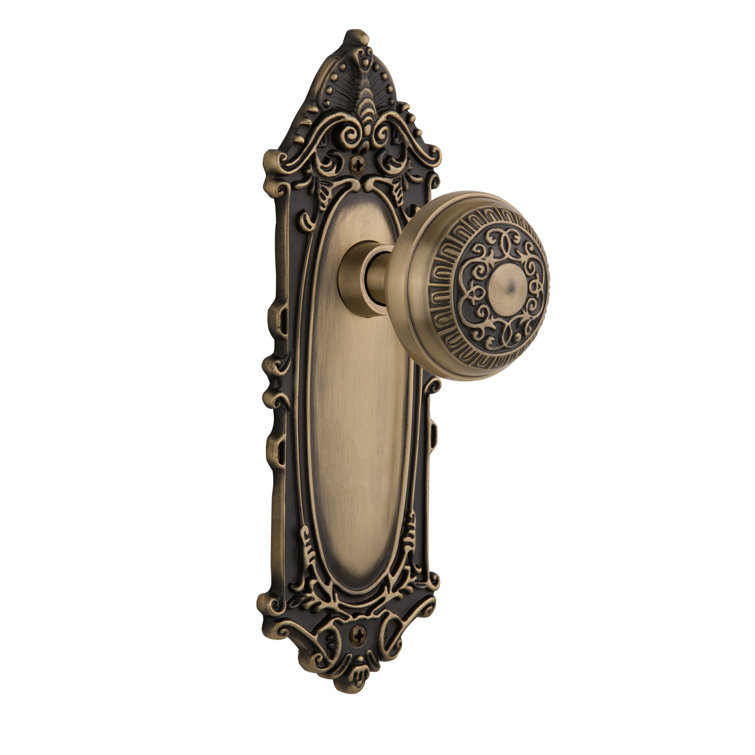 Antique Brass Victorian Plate with Egg and Dart Door Knob