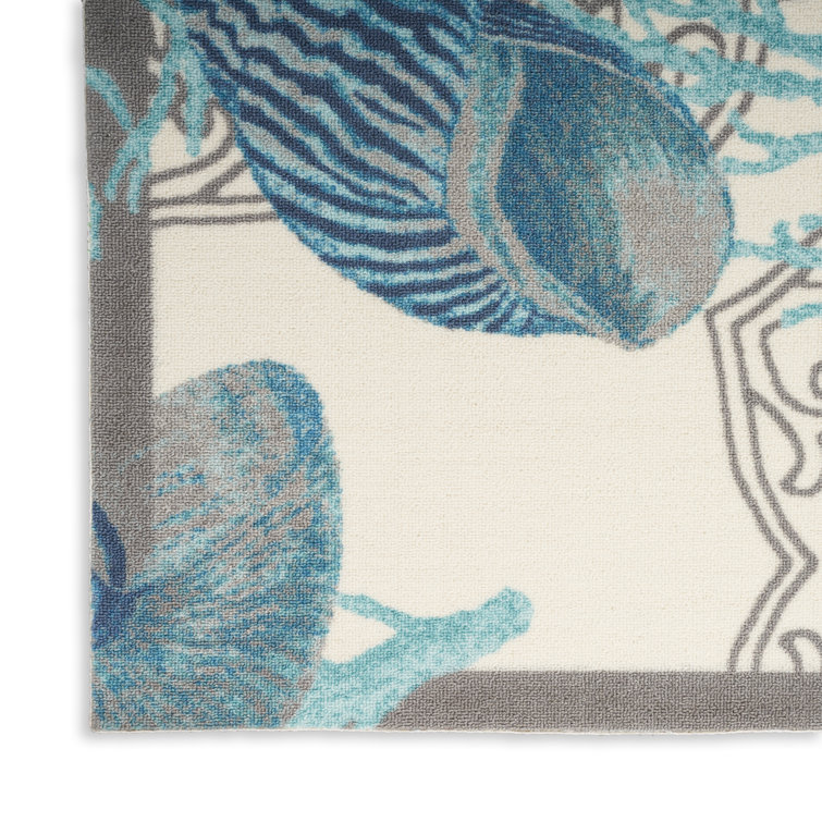 Ivory Blue Floral Synthetic Rectangular Area Rug 6'6" x 9'6"