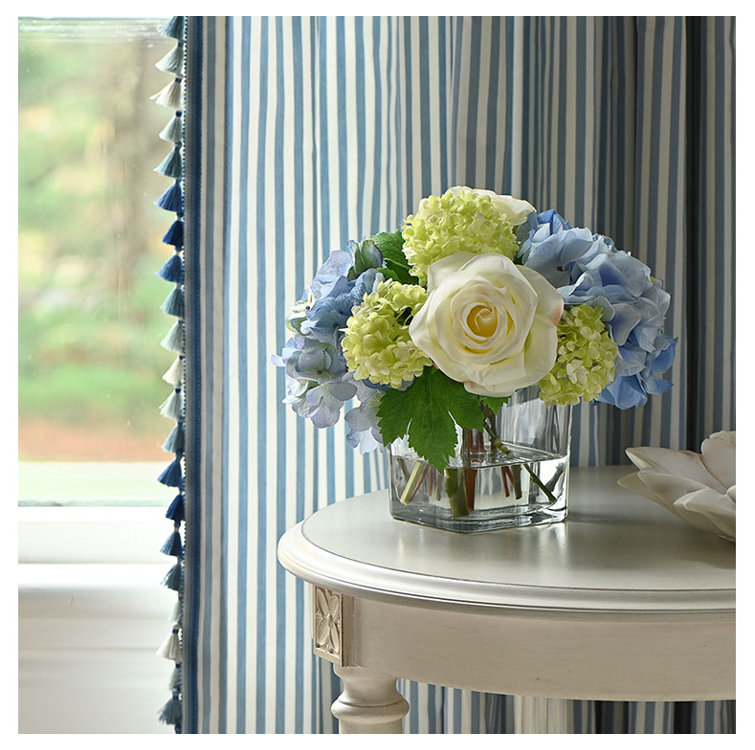 Blue Hydrangeas and Roses in Glass Vase Arrangement