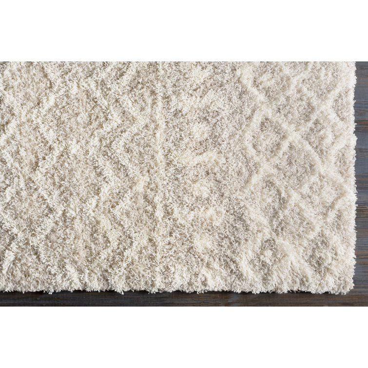 Round Beige and White Geometric Synthetic Area Rug