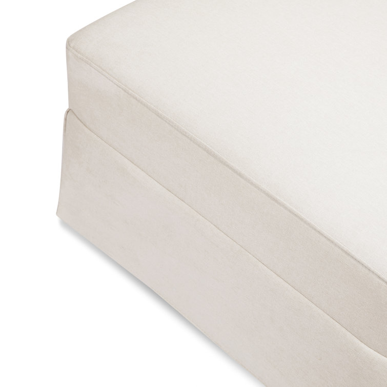 Cream Upholstered Gliding Ottoman with Skirt