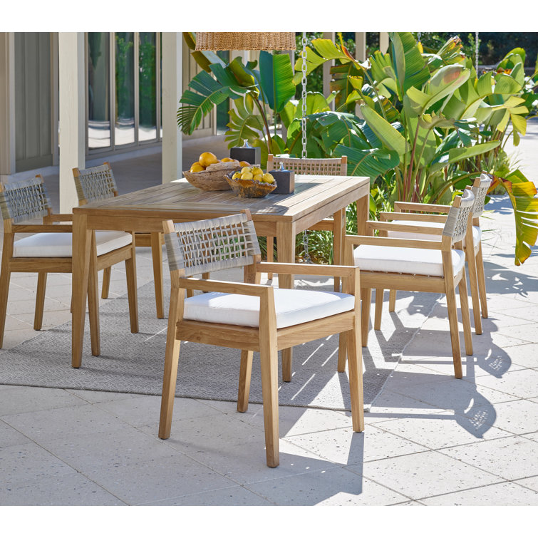Teak Outdoor Dining Chair with White Cushions and Wicker Back