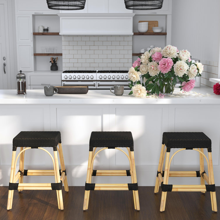Black and Natural Rattan Backless Counter Stool with Wooden Footrest