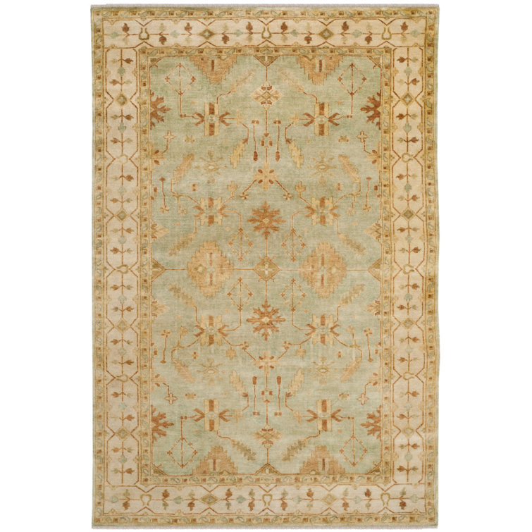 Elegant Oushak Ivory Wool 6' x 9' Hand-Knotted Area Rug
