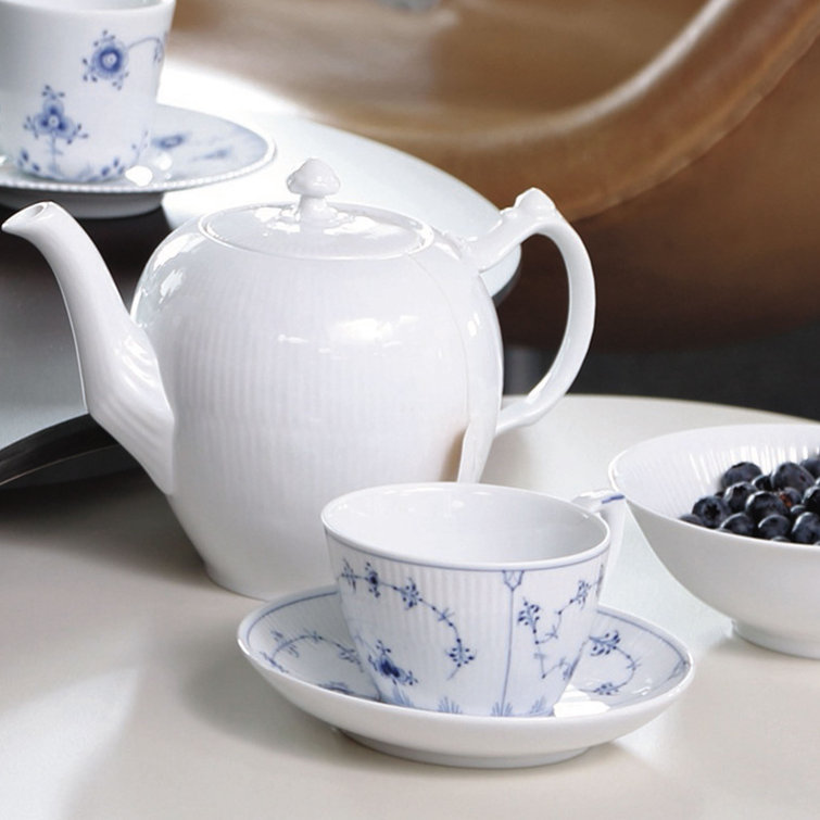 Blue Ribbed Ceramic Saucer with Floral Motif