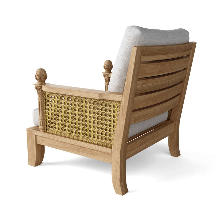 Teak Lounge Chair with Orange Cushions and Wicker Sides