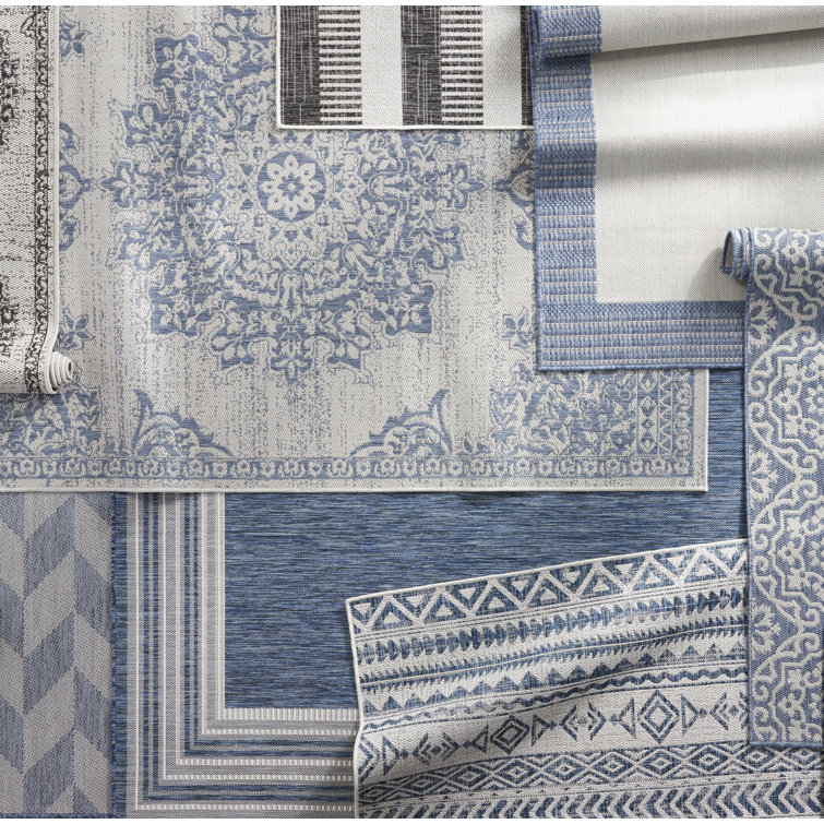 Blue and Cream Geometric 8' x 10' Synthetic Indoor/Outdoor Rug