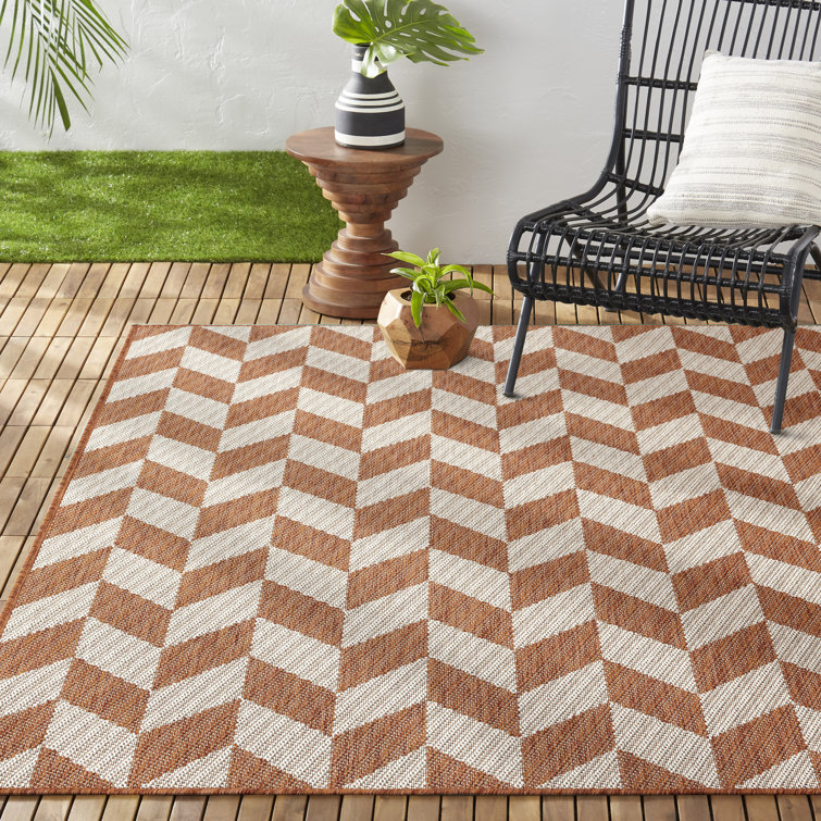 Orange and Ivory Geometric Synthetic Indoor/Outdoor Rug, 6' x 9'