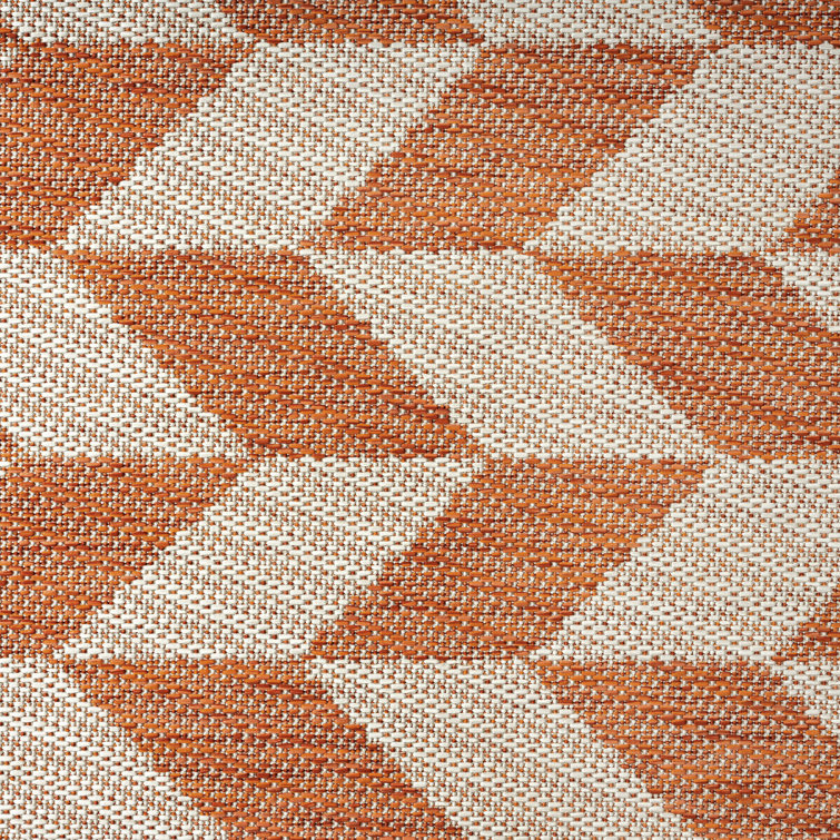 Orange and Ivory Geometric Synthetic Indoor/Outdoor Rug, 6' x 9'