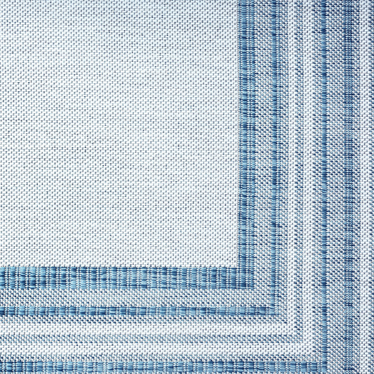 Blue and Ivory Striped Synthetic Indoor/Outdoor Area Rug