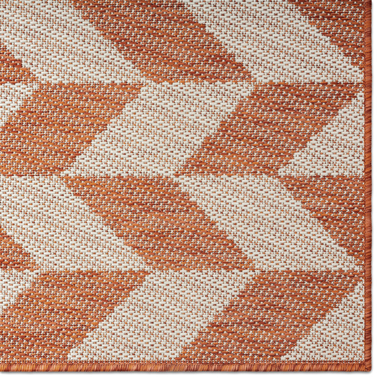 Orange and Ivory Geometric Synthetic Indoor/Outdoor Rug, 6' x 9'