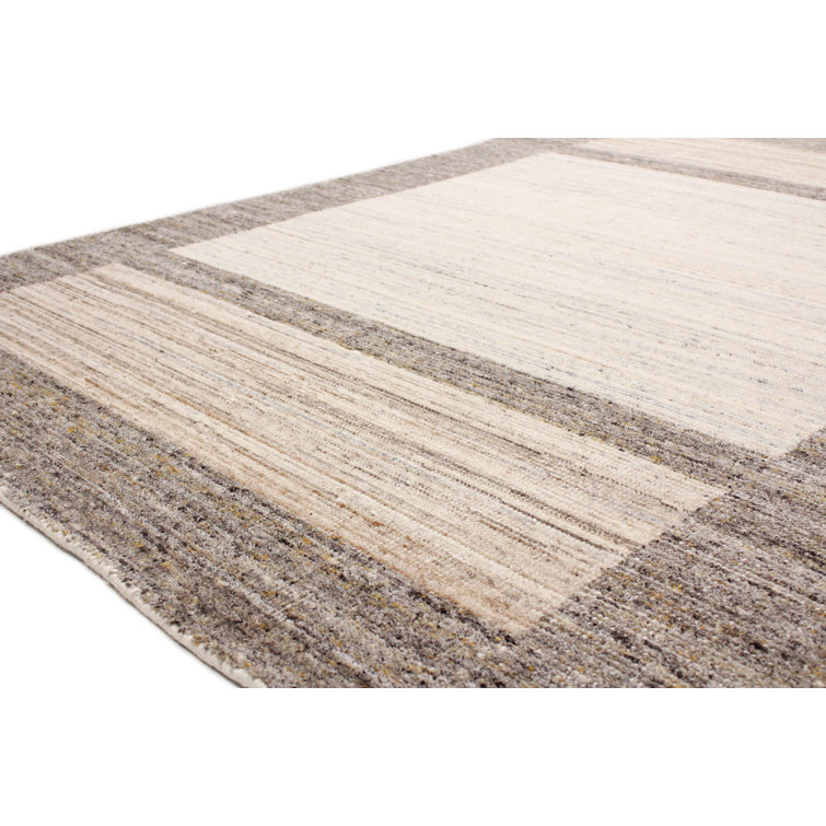 Ivory Hand-Loomed Wool 4' x 6' Rustic Area Rug