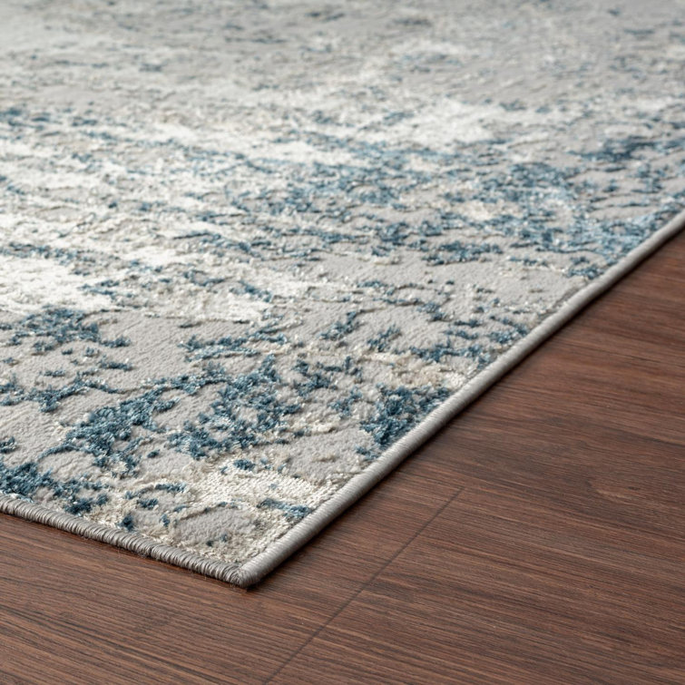 Blue and Ivory Abstract 9' x 12' Synthetic Area Rug