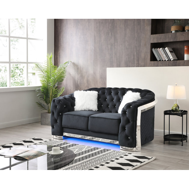 Lexi Chrome-Legged Black Velvet Tufted Loveseat with Faux Fur Pillows