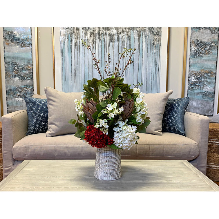 Red and White Hydrangea and Protea Floral Arrangement in Cream Clay Vase