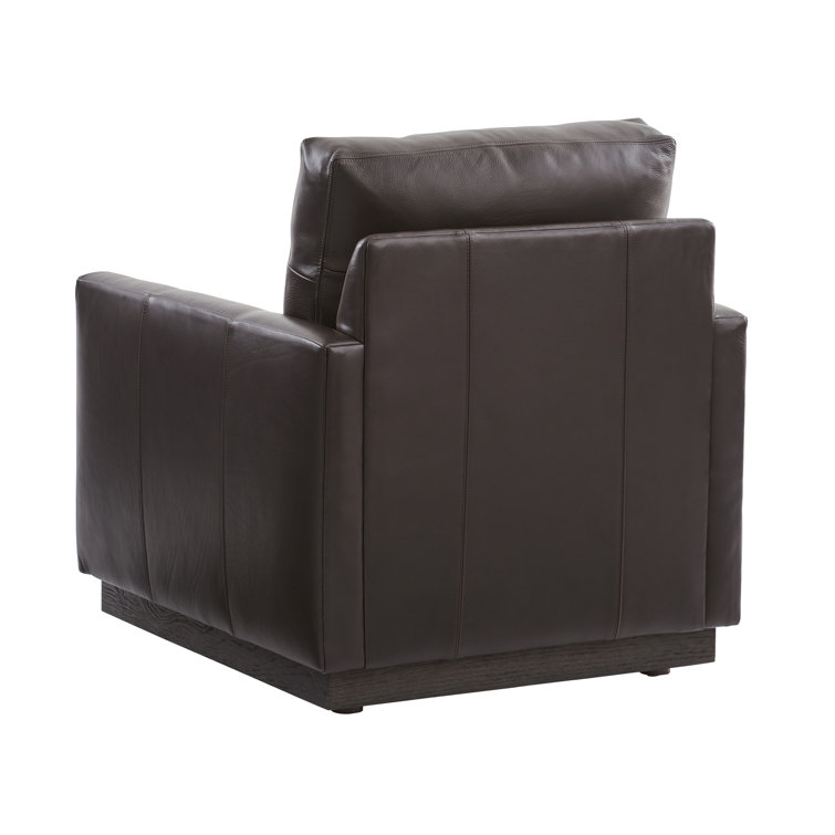 Arrowleaf Brown Leather Swivel Armchair with Wood Accents
