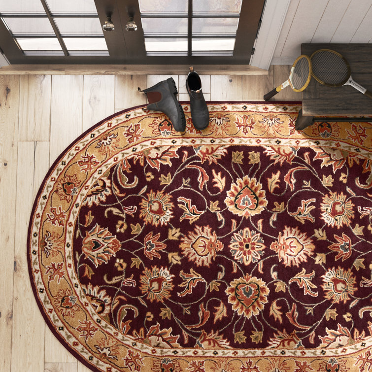 Handmade Round Burgundy and Gold Wool Area Rug
