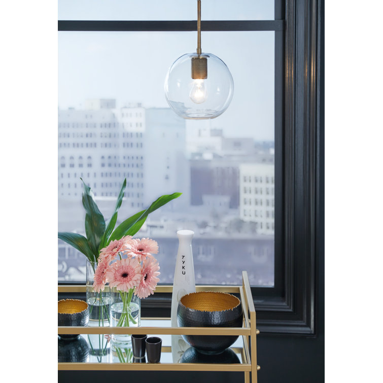 Cordunn 9" Clear Glass Globe Pendant with Antiqued Brass Finish