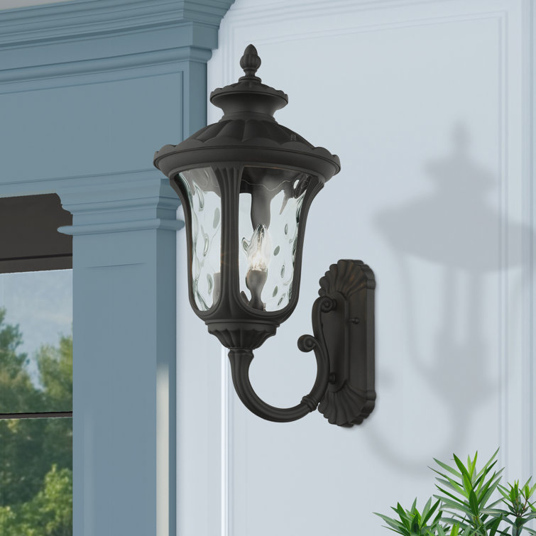 Artisanal Textured Black 3-Light Outdoor Lantern Sconce with Clear Water Glass