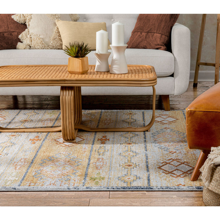 Cream and Red Synthetic Tribal Rectangular Rug