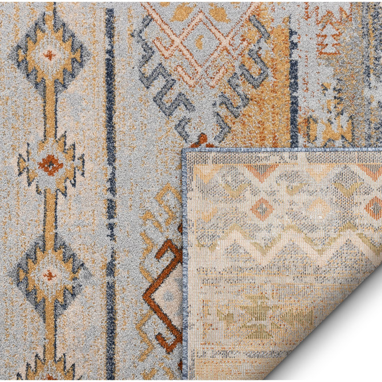 Cream and Red Synthetic Tribal Rectangular Rug