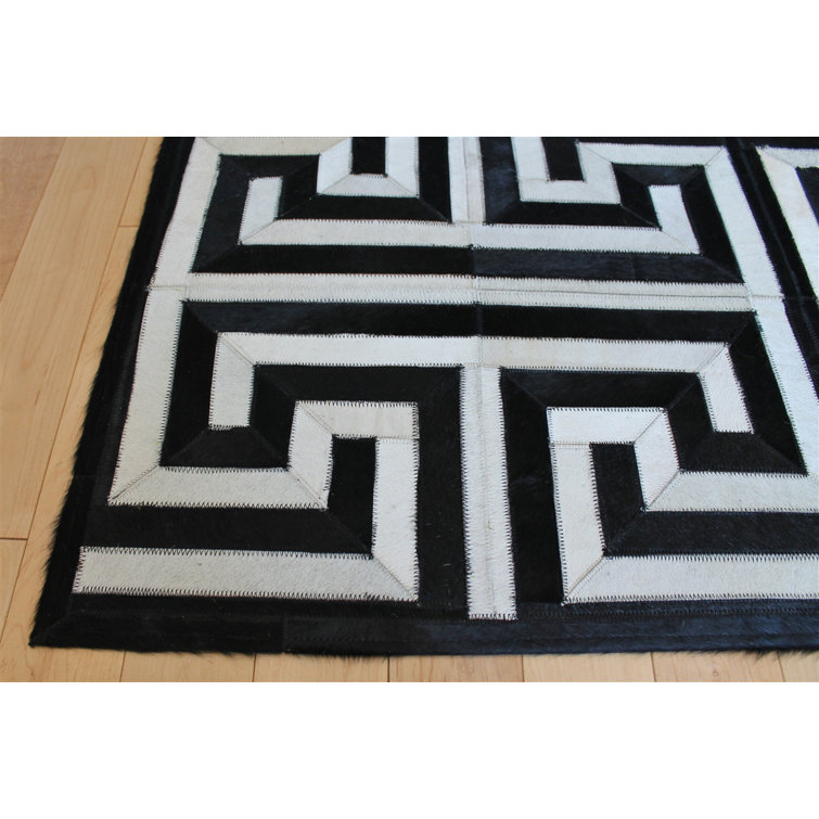 Handmade Black and White Geometric Cowhide Rug 4' x 6'