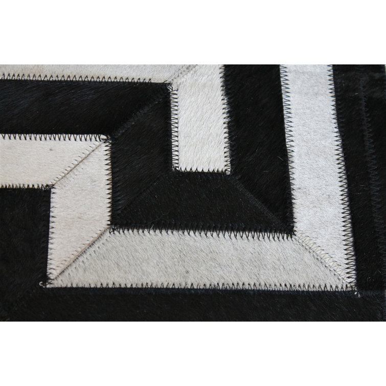 Handmade Black and White Geometric Cowhide Rug 4' x 6'