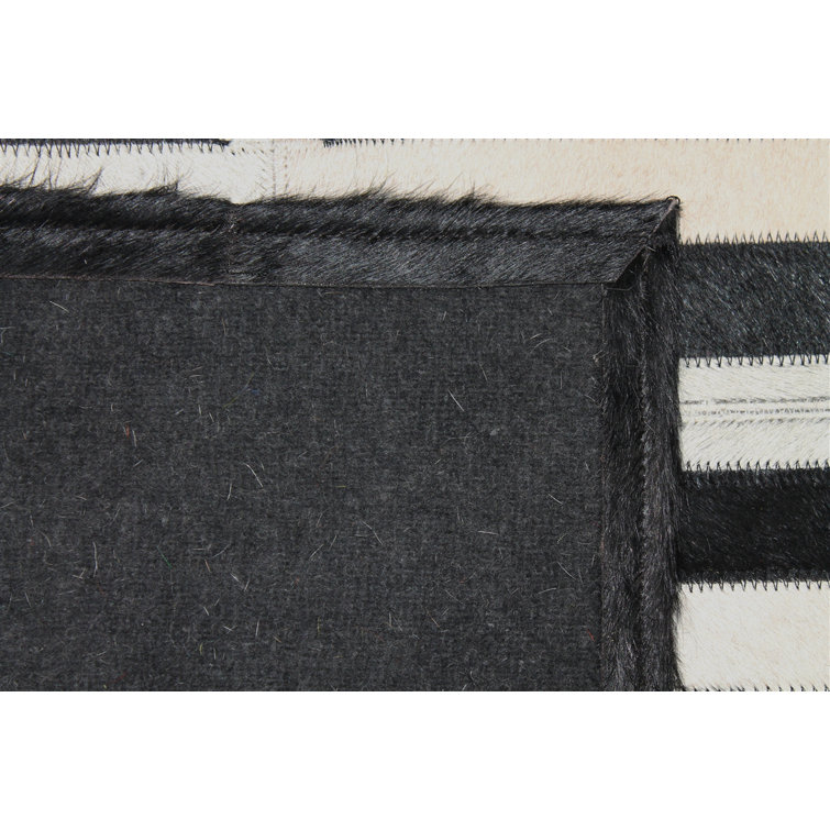 Handmade Black and White Geometric Cowhide Rug 4' x 6'