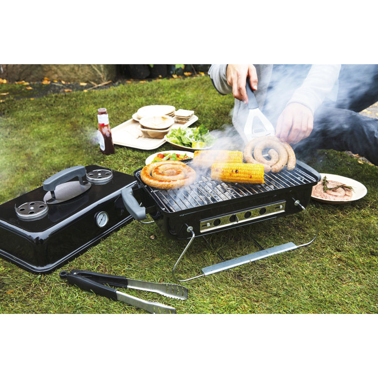 Compact Black Steel Portable Charcoal Grill with Porcelain-Enameled Lid