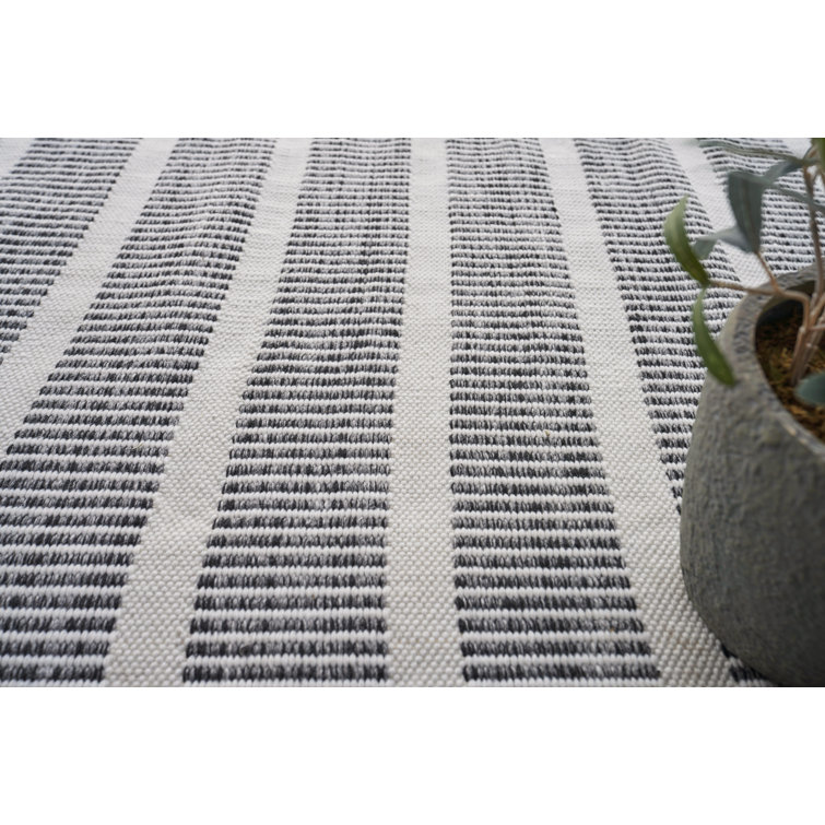 Ivory and Black Striped Synthetic Flatweave Rug 8' x 10'