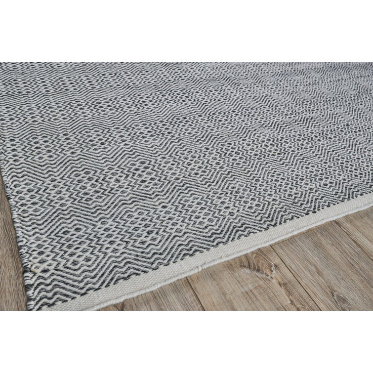 Ivory and Black Diamond Echo 8' x 10' Synthetic Area Rug