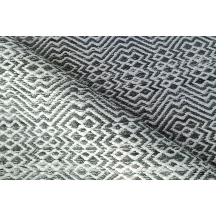 Ivory and Black Diamond Echo 8' x 10' Synthetic Area Rug