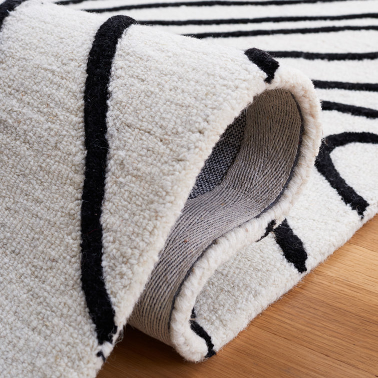 Felipe Handmade Black and Ivory Wool Rectangular Rug