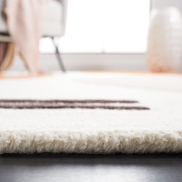 Ivory and Rust Hand-Tufted Wool 6' x 9' Area Rug
