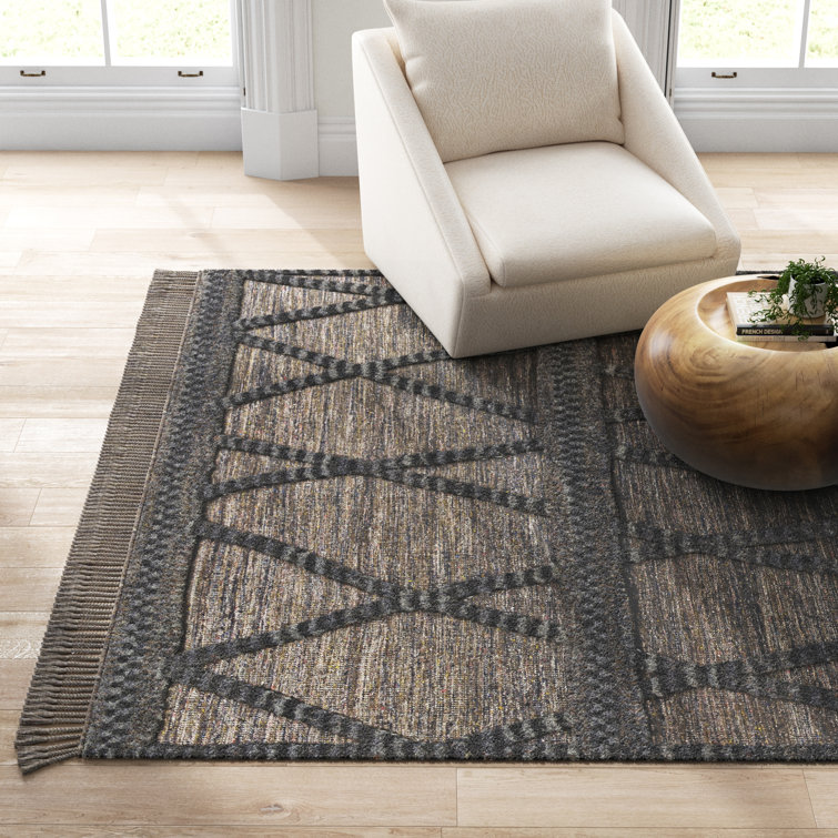 Handmade Black Wool 5' x 7'6" Rectangular Rug with Tassels