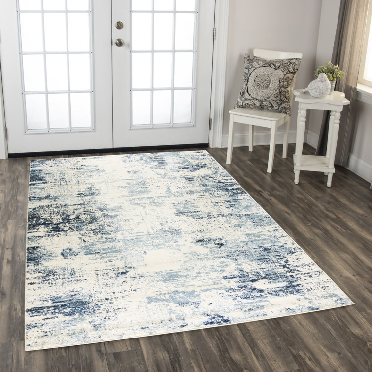 Ivory and Blue Abstract Synthetic Rectangular Area Rug 5'2"x7'3"
